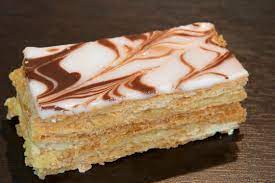 Bite through the crispy layers of this french fancy and enjoy a rich cream filling, sandwiched between the flaky pastry. Mille Feuille Wikipedia