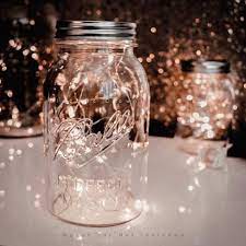 Whether it is for your wedding centerpieces, wedding favors, or general wedding decorations. Mason Jar Centerpieces Floating Candles Emmaline Bride
