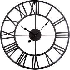 Nice large, black numbers on a white background with gold colored tick marks for the seconds… Amazon Com Linpote Large Metal Decorative Round Wall Clock 20 Inch 3d Hollow Out Wrought Iron Non Ticking Silent Wall Clock With Roman Numeral For Office Living Room Bedroom Kitchen Black Home Kitchen