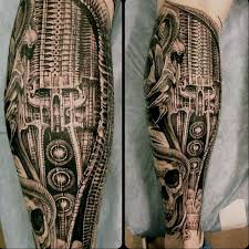 Biomechanik Tattoo 50 Bilder Mit Roboterhaften Motiven Biomechanik Tattoo Bein Tatowierungen Biomechanik