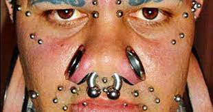 Yes, breast enlargement is a body modification. 13 Most Extreme Body Modifications Cbs News
