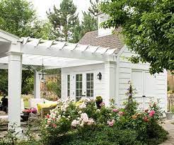 14 Clever Tricks To Make Your Small Backyard Live Large Backyard Small Backyard Pergola