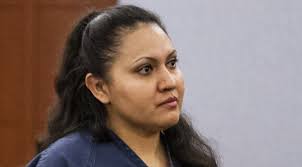 Las Vegas woman pleads guilty to throwing kids from window