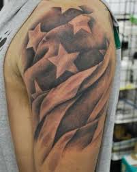 Simple Black American Flag Tattoo This Is A Simple Tattoo Design Too But Still Catches The Eye It Has Few Stars Drawn On The Arm And A Shading Of Flag Tattoo Star Tattoos American Flag Tattoo