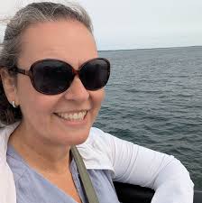 What French novels are suitable for an 11th grade student who enjoys  adventure and realistic fiction?