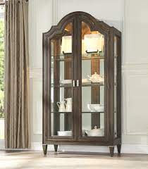 Types of curio cabinets vary almost as much as varieties of flowers, so the ideal lighting for one unit is less than optimal for another. Peregrine Walnut Touch Light Curio Cabinet