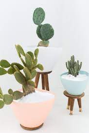 Adjustable and tall either bamboo or acaica, mix with our large plant basket pots. Diy Mid Century Stand Planters Sugar Cloth Decor