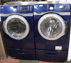 The dryer part number is torn off where the plastic sticker has started to deteriorate. Kenmore Elite Blue Washer Dryer Set W Underneath