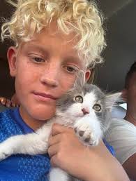 Raccoon feeding and animal lover