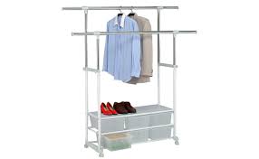 For a variety of storage options, choose a rack that also has clothing shelves to store shoes, bags, sweaters and other folded items. Clothes Holder With Storage Cabinet Mobile Clothes Rack Rolling Clothes Stand Product Orbit