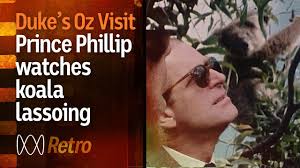 Prince Philip watches koala get lassoed
