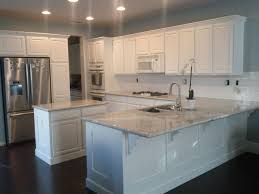 Black And White Granite Countertops With White Cabinets Pin By Camille Williams On My House Current Remodel Projects White Granite Countertops River White Granite Kitchen Outdoor Kitchen Countertops