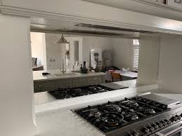 Quite similar to the first idea, the fifth of our overall mirrored kitchen backsplash ideas utilize large, plain sheets. Mirror Glass Splashbacks Kitchen Design For That Wow Factor