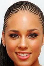 Braids hairstyle with low bun. Alicia Keys Braids Hairstyles Cornrow Hairstyles Braided Hairstyles Hair Styles 2014