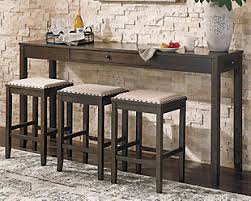 Shop for console table with stools online at target. Rokane Counter Height Dining Table And Bar Stools Set Of 4 Ashley Furniture Homestore