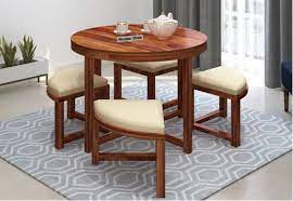 Whether it is your day at work or the kid's day at for instance, a 4 seater round dining table is always a fun and relaxed choice, adding an air of laid back comfort to your home, while a dining table. Round Dining Table Buy Round Dining Table Set Online At Low Price In India