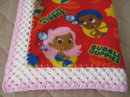 You can choose from gil or oona. Bubble Guppies Fleece Blanket With Crochet Border Etsy Fleece Blanket Bubble Guppies Blanket