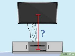 Drill the holes, feed the tv cables through the power module and down inside the. 3 Ways To Hide The Wires On A Hanging Tv Wikihow