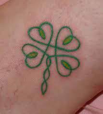 The meaning of this design is derived from the clover leaf that has been associated with good luck because of the fact that it is rare to find it. Four Leaf Clover Tattoo Designs And Meanings Four Leaf Clover Tattoo Ideas Clover Tattoos Shamrock Tattoos Four Leaf Clover Tattoo