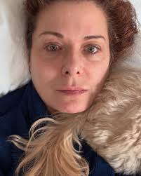 I've got the flu… This is how Elsie comforts me. Got my chicken soup. Send  favorite remedies!❤️