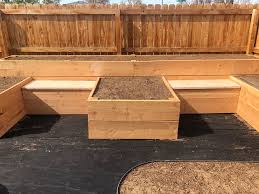 I've also read that if you paint the outside with black bituminous paint, slugs and snails won't cross it into your bed. How To Build Cheap Raised Garden Beds With Storage The Bonus Space