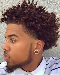 Make a middle parting and brush your shiny black hair nicely on both sides of the parting. 26 Fresh Hairstyles Haircuts For Black Men In 2020