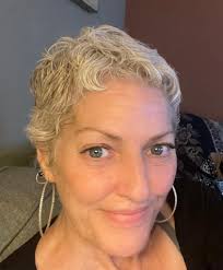 Face-framing platinum pops paired with deep brunette and tousled  layers—bold contrast, major style. What do you think of this look?