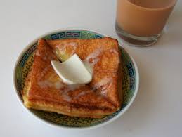 The recipe says to break slice fine white bread, crust removed, into rather large pieces which soak in milk and beaten eggs fry in oil, cover with honey . How To Make Hong Kong Style French Toast Chinese American Family