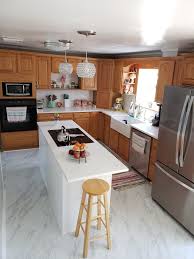 White Kitchen With Honey Oak Cabinets Honey Oak Cabinets Kitchen Cabinets And Flooring Vinyl Flooring Kitchen