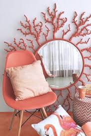 A plush lavender chair with coral trim complements the white and coral ottoman, while the crib you might think coral pink would be a tough color to pull off, but it looks right at home paired with a pale cream brick. Don T Miss Out On Decorating Your Home With Color Of The Year
