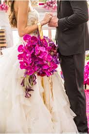 Sean money + elizabeth fay via ruffled blog featured photography: Purple Orchid Bouquets Wedding
