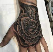 Awesome money tattoo designs, best money. 21 Money Rose Tattoo Designs For Hand