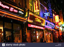 Indian Restaurants In Brick Lane London Stock Photo Alamy