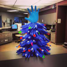Nurse Christmas Tree I Made Out Of Gloves Cotton Balls And Chart Stickers Nurse Christmas Christmas Crafts Holiday Tree