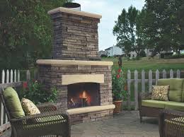 Accompanying the fireplace are two rustic rocking chairs. 45 Beautiful Outdoor Fireplace Ideas Install It Direct