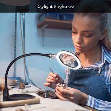 It features a dimmer switch, so you can control the exact amount of light it emits. Brightech Lightview Pro Flex Magnifying Lamp 2 In 1 Clamp Table Desk Lamp Energy Saving Led Ultra Bright Daylight Light Great For Reading Hobbies Crafts Workbench Black Buy Online At