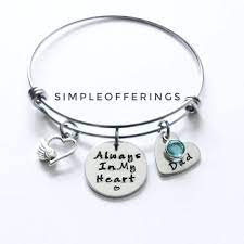 Available in a variety of styles, from charm bracelets to bangles, a cremation bracelet allows you to include a small pinch of cremains, burial soil, or other memorial item right in the jewelry to keep it with you always. Memorial Bracelet Memorial Gift Memorial Jewelry Dad Mom Etsy Remembrance Jewelry Memorial Bracelet Remembrance Bracelet