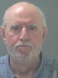 Milton man charged with trying to run over his neighbor with his car