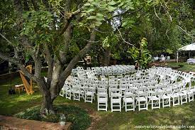 A popular option for any wedding style, these folding chairs can be left alone or easily dressed up using aisle markers and other adornments. White Folding Chairs Athens Atlanta Lake Oconee Chair Rental By Oconee Events