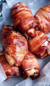 Bacon Wrapped Chicken Thighs Seasoned With Honey Lime Garlic Then Wrapped In Bacon And Cooked To Crispy To Bacon Wrapped Chicken Chicken Wraps Bacon Wrapped