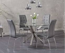 Round Dining Sets Are Perfect For Creating Cosy Dining And Drinking Hubs In Your Home And The Rio Round Glass Dining Table With Calgary Chairs Is No Exception Glass Dining Room