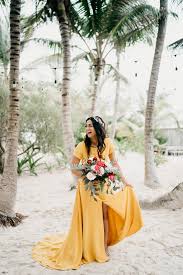 Beach weddings call for a totally different set of dress codes. 33 Beach Wedding Dresses Real Brides Wore That We Love Martha Stewart
