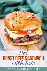 Hot Roast Beef Sandwich With Brie And Tomato Pinch Me I M Eating Recipe In 2021 Hot Roast Beef Sandwiches Deli Roast Beef Recipe Roast Beef Sandwiches