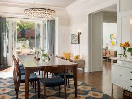 The effect is amplified when the rug is used with an oval table and rounded lighting options. Your Guide To Choosing The Right Rug For The Dining Room