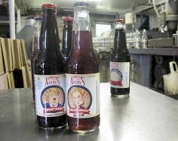 Samples Of Avery S Beverages Latest Specialty Sodas Trump Tonic Left And Hillary Hooch Stand On A Table At The Company S Bottling Drinks Hooch Grape Soda