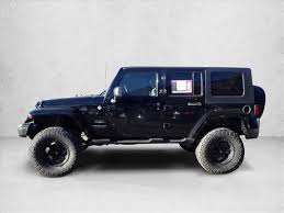 Image result for Brilliant Black 2009 Jeep