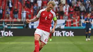 Denmark's captain, simon kjaer, and others comforted eriksen's partner when she rushed to the field. Pf4svmd80 0com