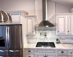 Geneseo Il Kitchen Design With Koch Cabinetry And Tall Hood With Cathedral Ceiling Design By Chris Robinson Of Village H Kitchen Hazelwood Home At Home Store