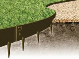 To place the lawn edging, dig a trench around the garden bed and cut away any roots. 8 Best Lawn Edging Ideas Lawn Edging Garden Edging Lawn