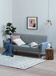 When choosing larger furnishings, like a sofa or shelving system, stick to solid colors and lighter woods. How To Decorate A Small Living Room